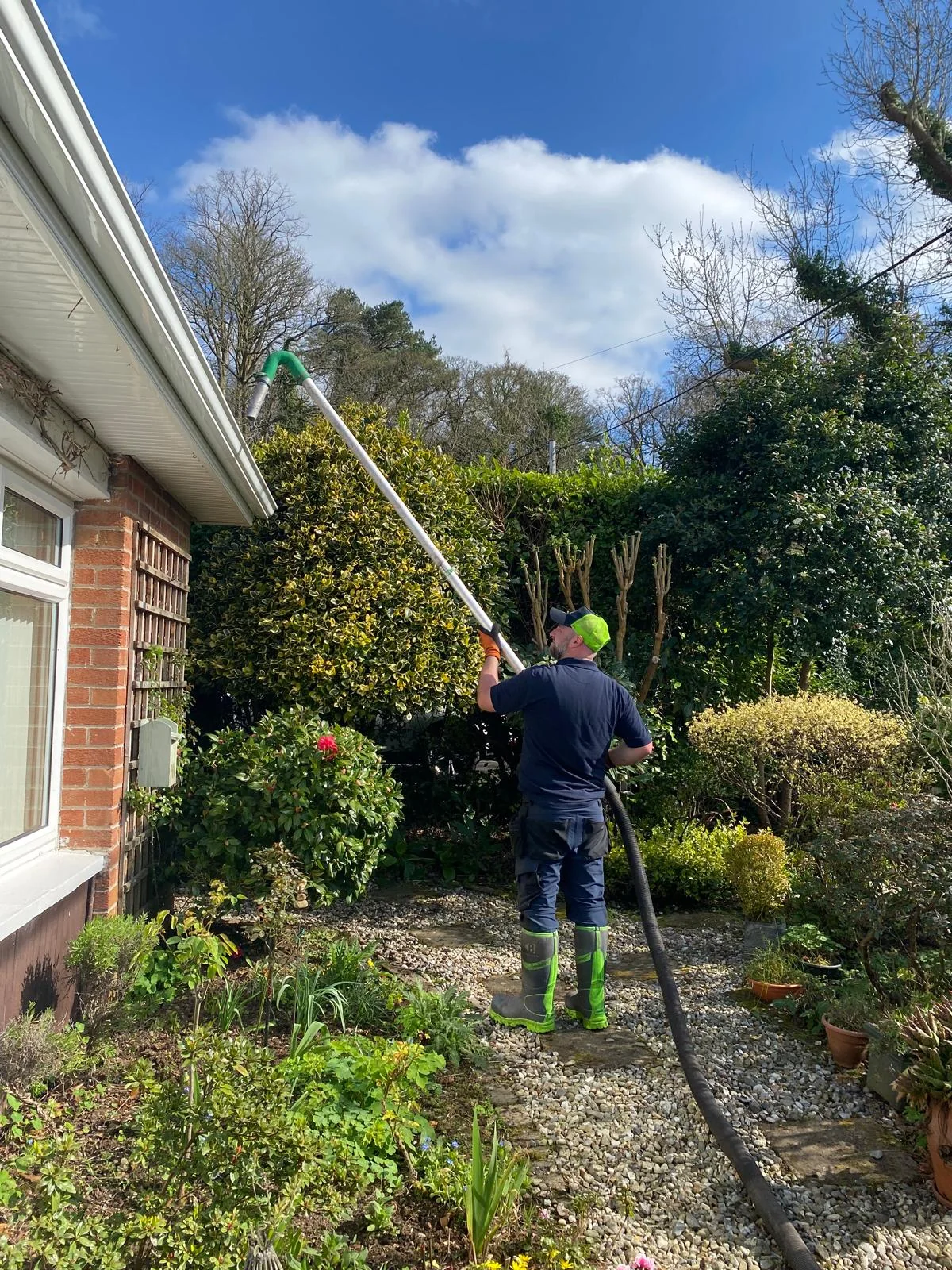 Gutter-vac clearance from a garden path