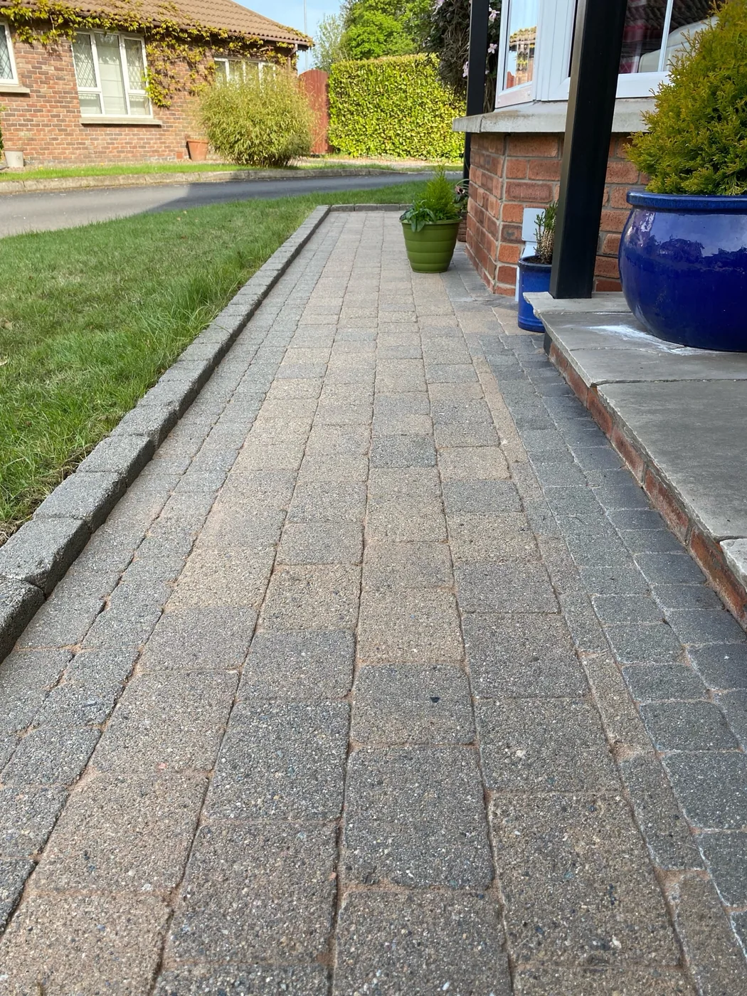 Cleaned front path at a roof-to-drive exterior clean