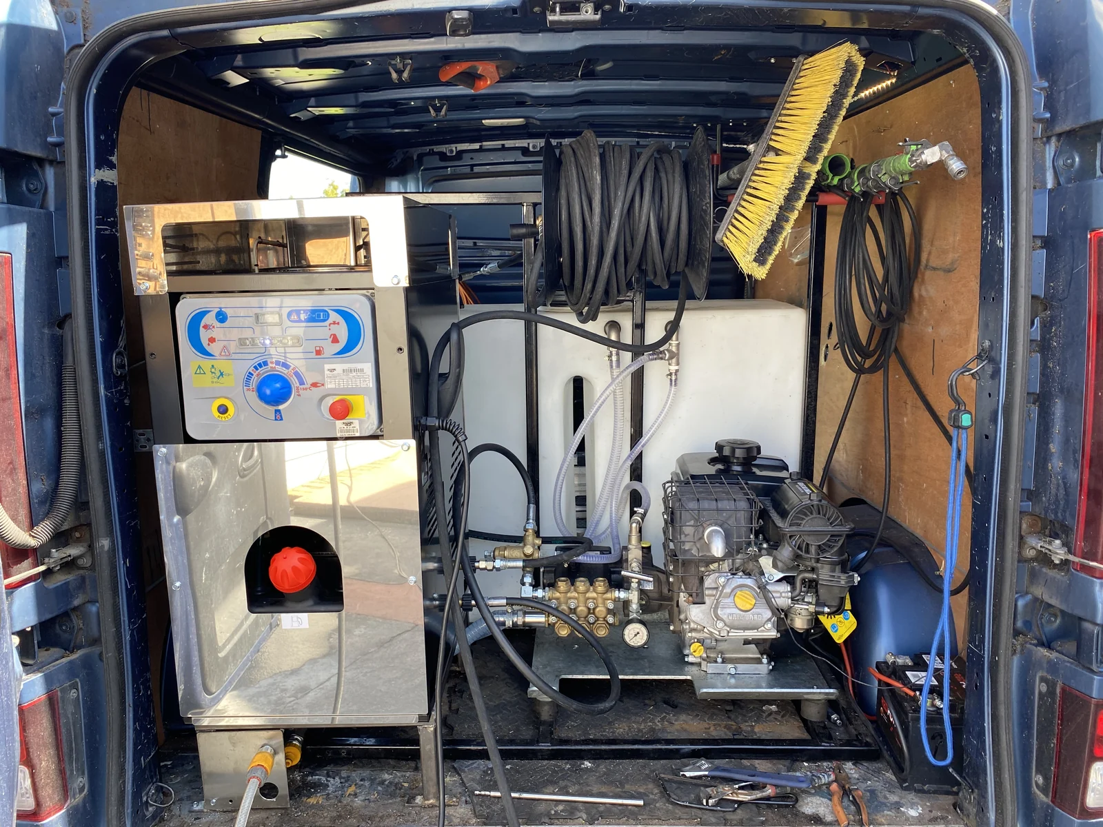 CleanCoat van-mounted roof cleaning equipment with Mazzoni hot box, hoses and pressure gauge